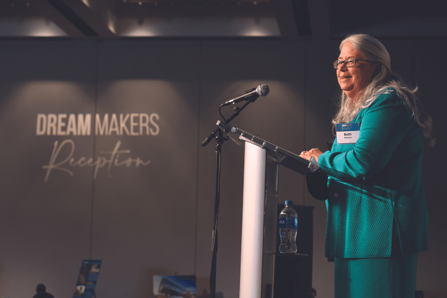 Dean Elizabeth Merwin addresses attendees of the Dream Makers reception.